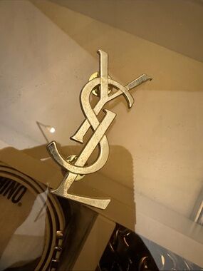 Yves Saint Laurent Metallic Gold Interlocking Logo Art